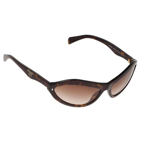 Prada Tortoise Shell Swing SPR 05N Sunglasses Prada 